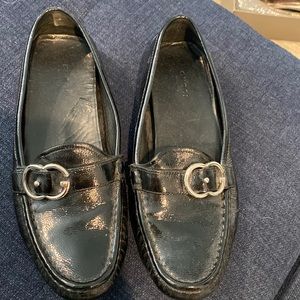 Black Gucci driving loafers.